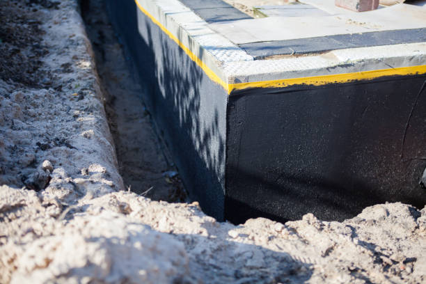 Professional Waterproofing technician working in Cedarhurst, NY